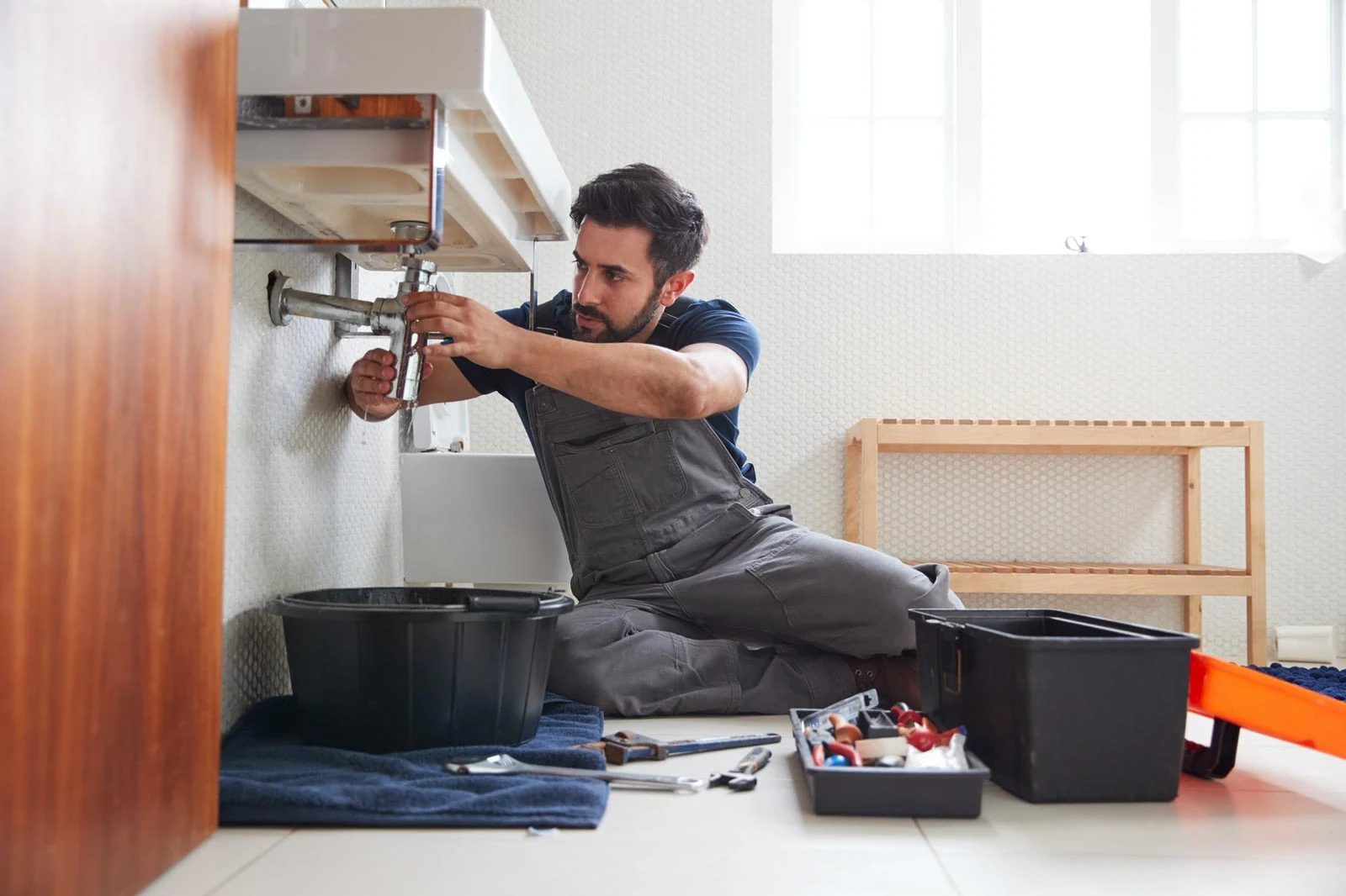 Plumber working image